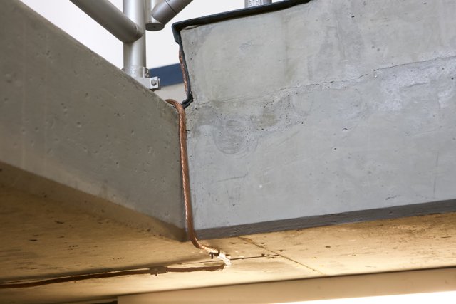 Pipe Attached to Concrete Wall