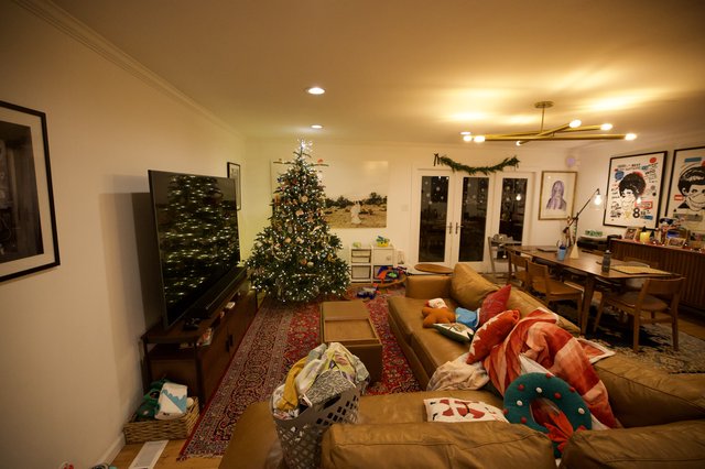 Cozy Family Living Room with Festive Christmas Tree