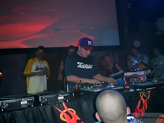 Mix Master Mike Entertains the Crowd in his Baseball Cap
