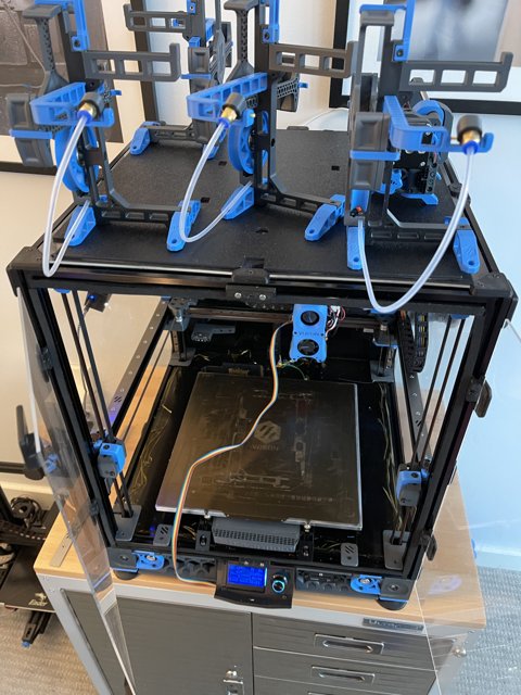 Innovative 3D Printer in Blue and Black Frame