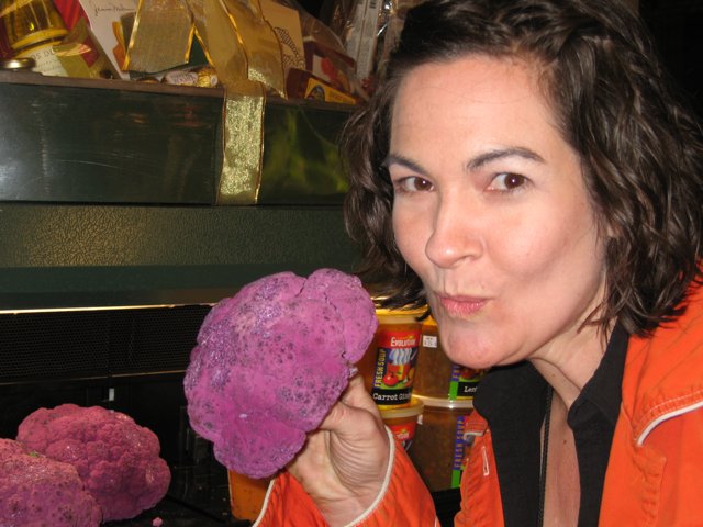 Woman Holds a Mysterious Purple Rock