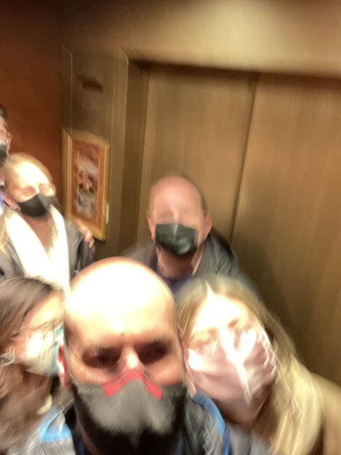 Elevator Selfie with Masks