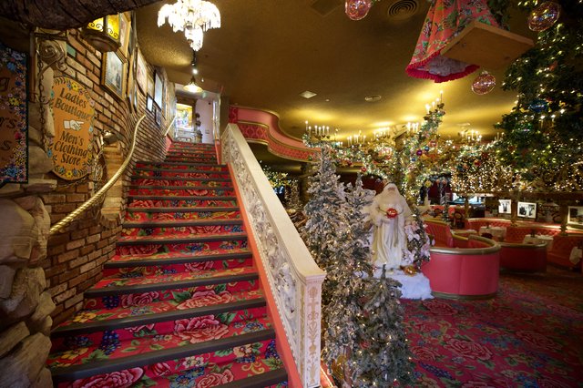 Whimsical Christmas Decorated Interior with Ornate Staircase