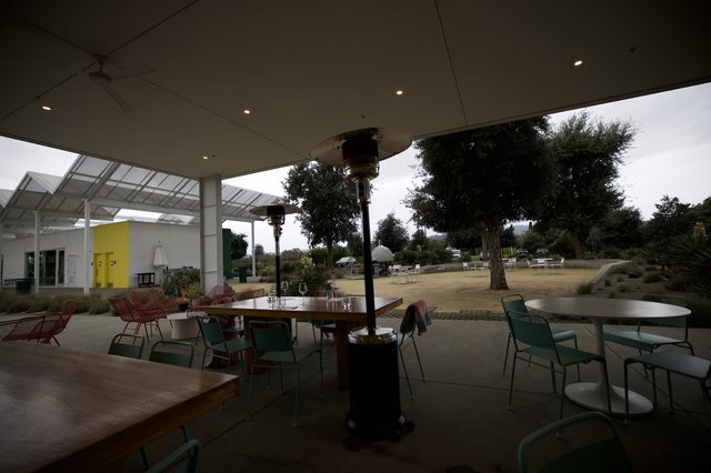 Modern Outdoor Dining Patio with Heat Lamps