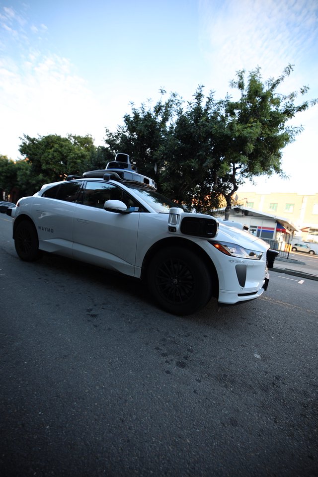 Waymo Autonomous Electric Vehicle on City Street