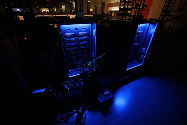 Blue-Lit Audio Rack Systems Backstage at Wobbleland