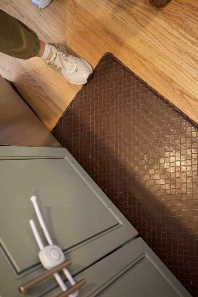 Kitchen Transition: Wood Floor Meets Copper Tile