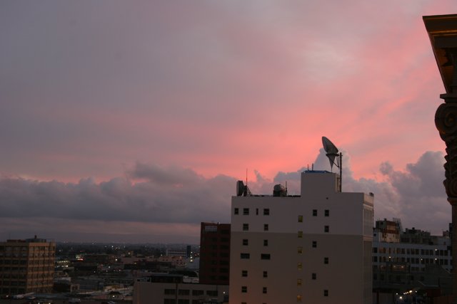 Urban Sunset Over Metropolis Building