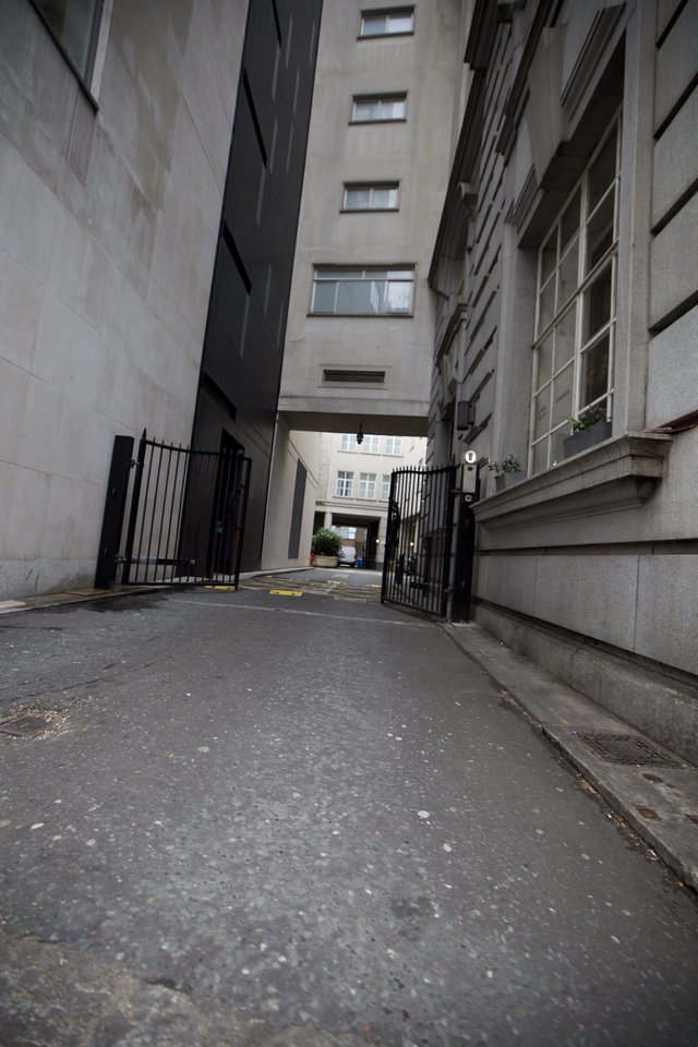 Narrow Urban Alleyway Between Modern London Buildings