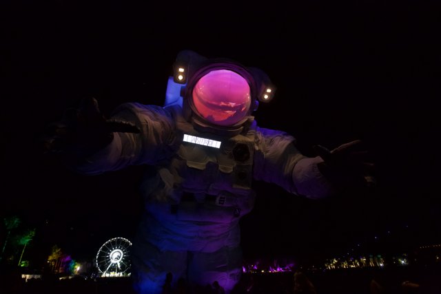 Giant Astronaut Statue in the Night Sky