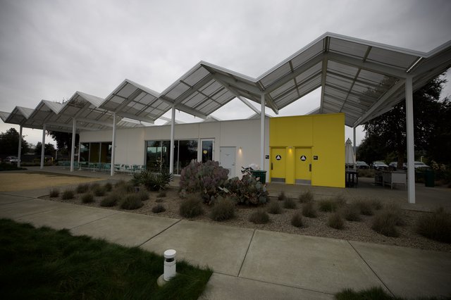 Modern Restaurant with Distinctive Zigzag Solar Canopy