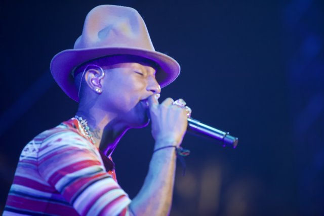 Hat-wearing Pharrell Williams Takes the Stage at Coachella 2014