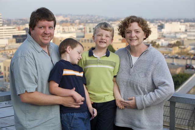 Family Portrait on Urban Rooftop at Dusk