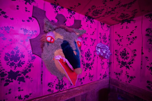 Surreal Pink Room Installation with Floating Figure
