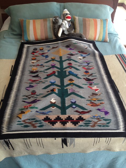 Cozy Applique Blanket on a Bed