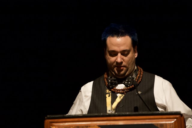 Blue-Haired Speaker Takes Center Stage