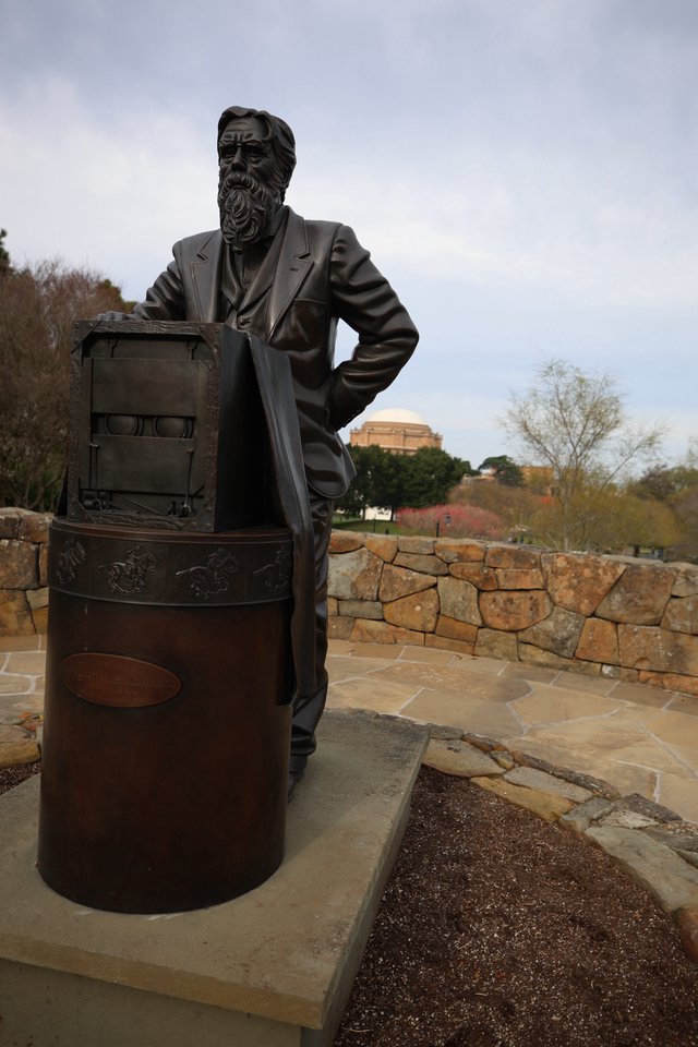 Bronze Statue of Bearded Man with Historic Equipment