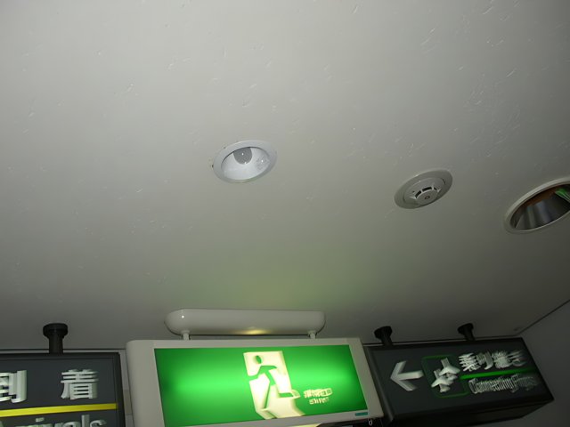 Green sign above the ceiling