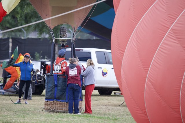 Ground Crew Prepares Hot Air Balloon for Launch