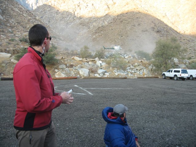 Father and Son in the Gravel Lot