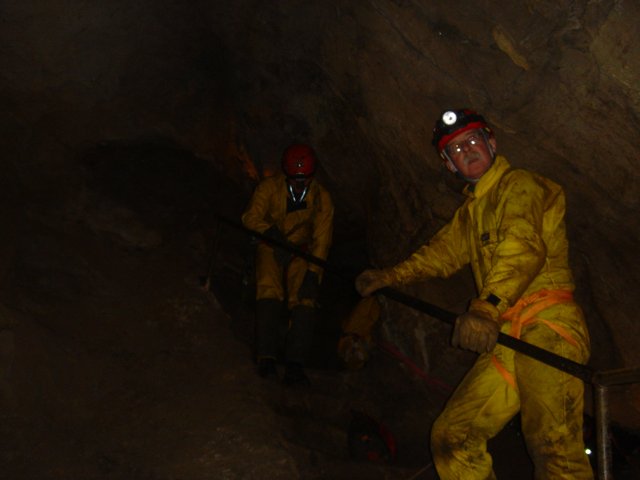 Yellow-suited Cave Worker