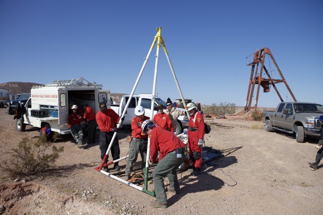 Red-Shirted Workers on a Mine Rescue Mission