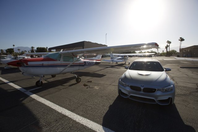 BMW M5 and Small Airplane at Bermuda Dunes Airport