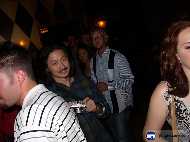 Mustached Man at a Nightclub Party