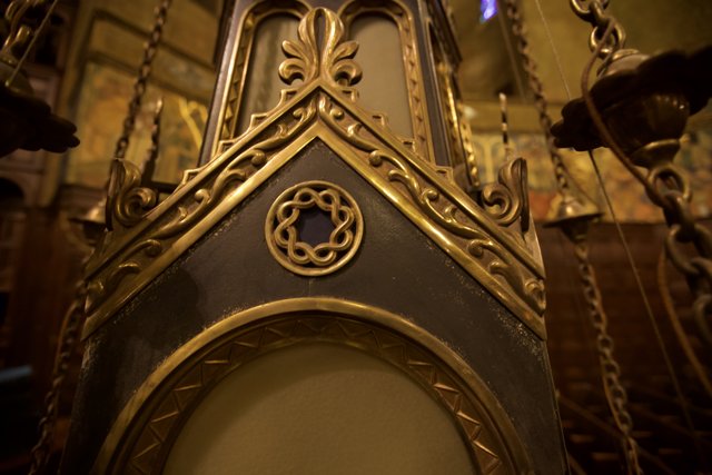 Gilded Timepiece in Church