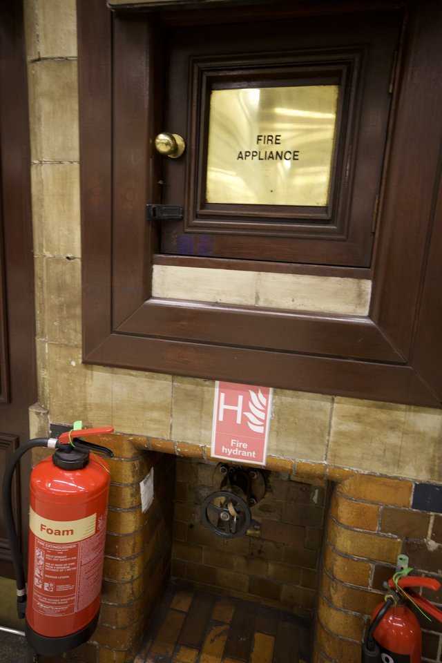 Fire Safety Equipment Cabinet in Historic London Building
