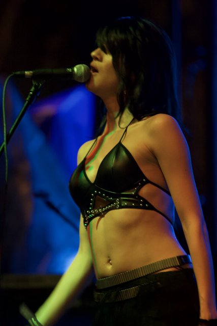 Bikini-clad Singer Rocks the Stage
