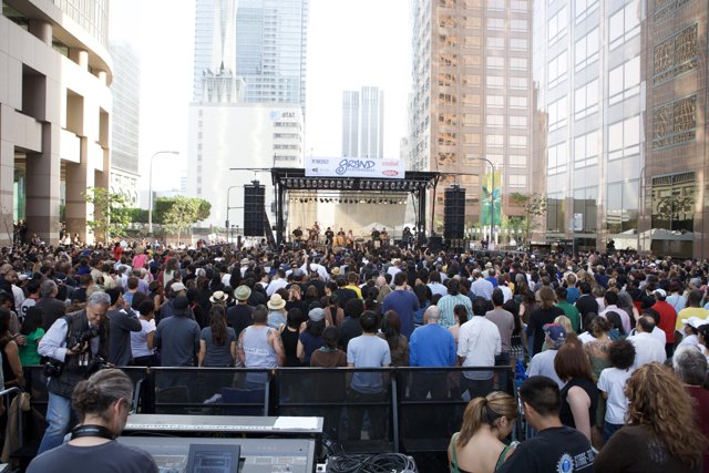 Crowd Jamming to Ozomatli's Grand Performance in City Square