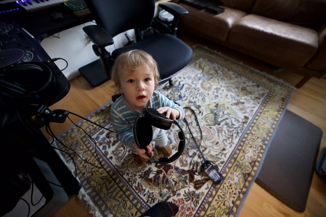 Toddler with Headphones in Home Music Studio