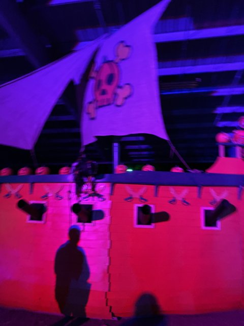 Pirate Ship Illuminated in Purple Lights