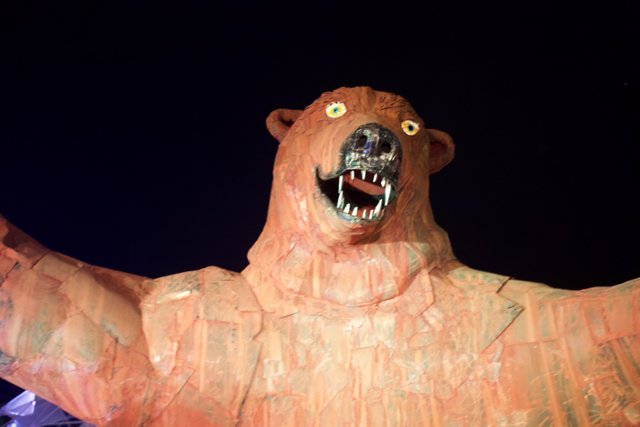 Bear Statue Embraces the Night Sky