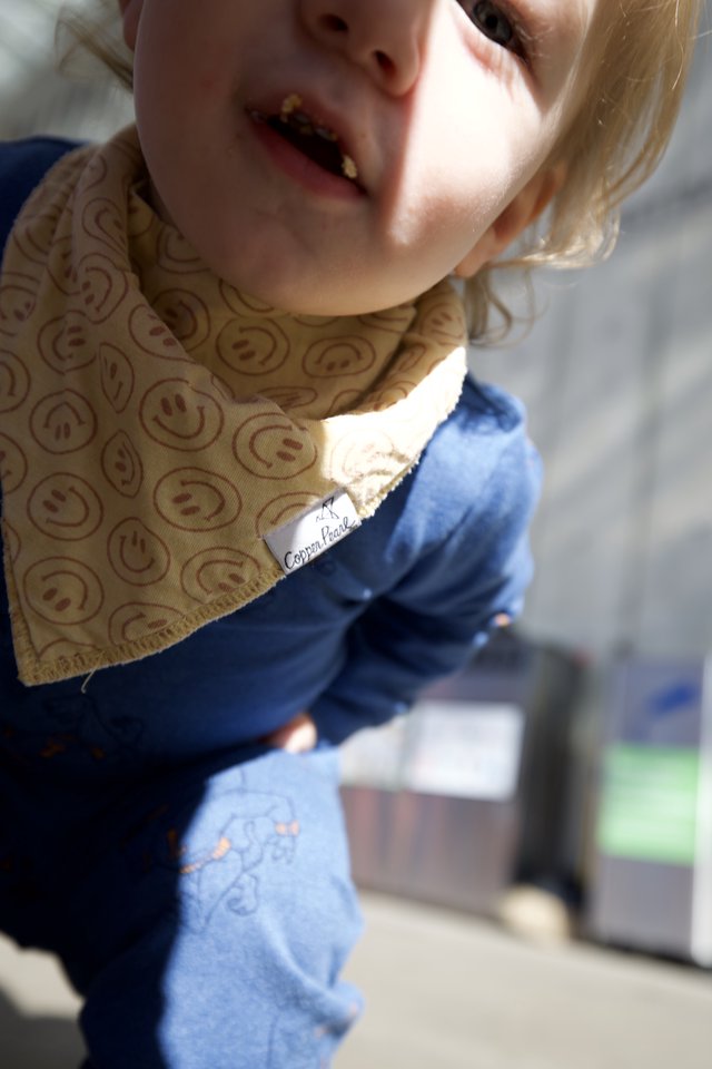 Young Child in Handmade Smiley Face Bandana