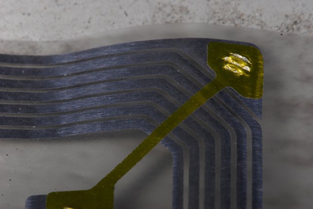 Hardware Detail: Yellow Striped Metal