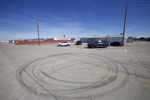 Tire Marks on Empty Parking Lot at USS Hornet