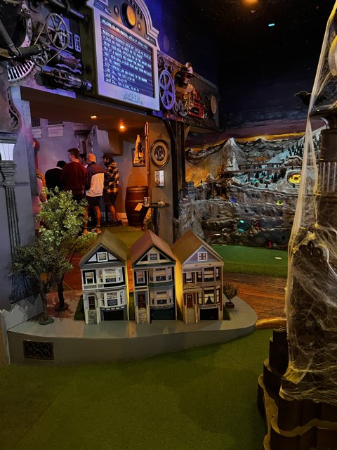 Miniature Golf Course with Fake House and Spider at Urban Putt