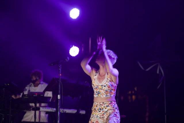 Floral-Dressed Woman Enchants Coachella Crowd with Her Melodic Voice