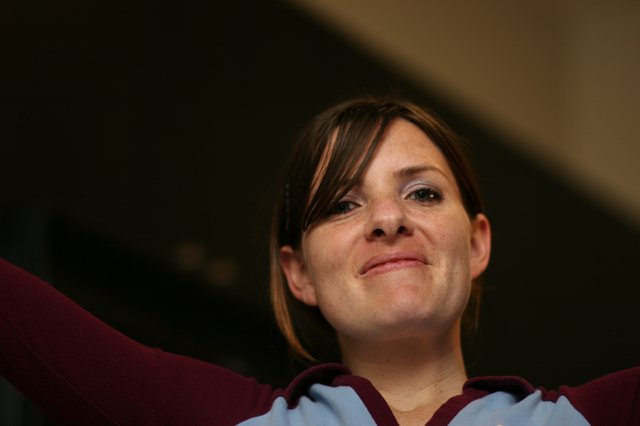 Football Fan Celebrates in Claret and Blue