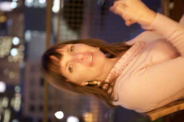 Penelope Smiling Softly at Sakura Crossing Night