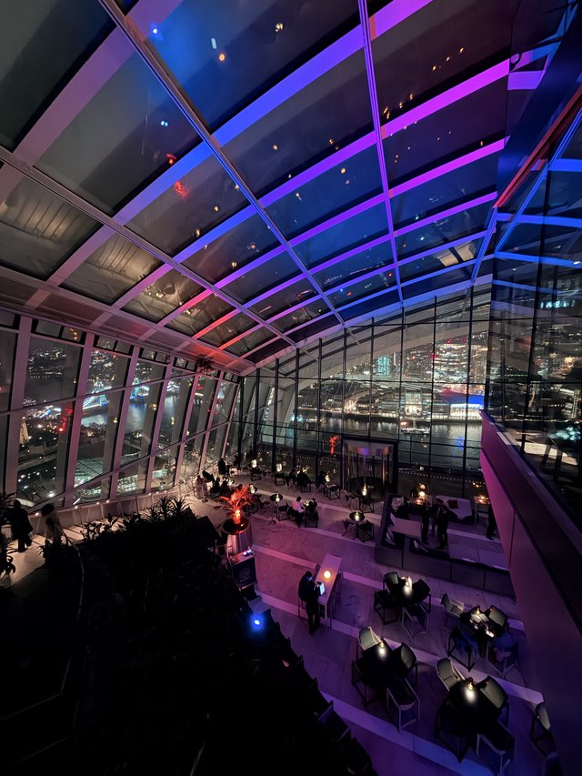 Modern Sky Garden Restaurant with Purple Ambient Lighting