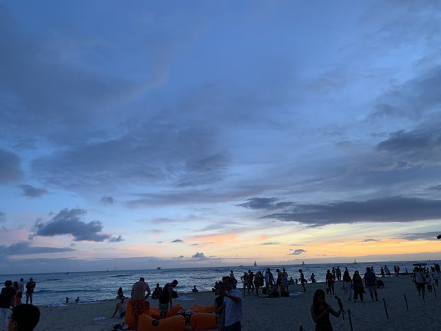 Sunset Gathering on Waikiki Beach