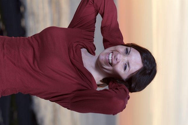 Joyful Woman at Sunset by the Sea