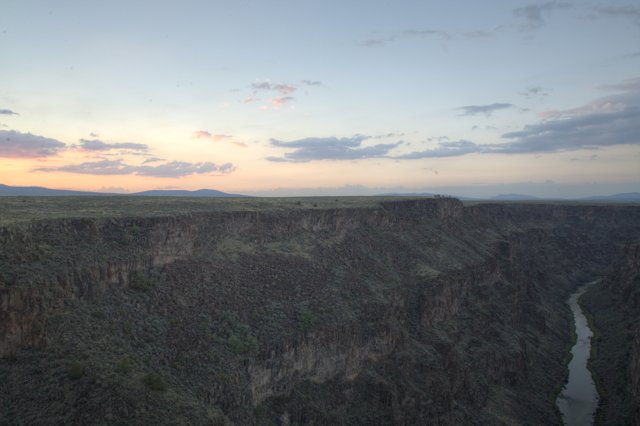 Sunset Over a Canyon River