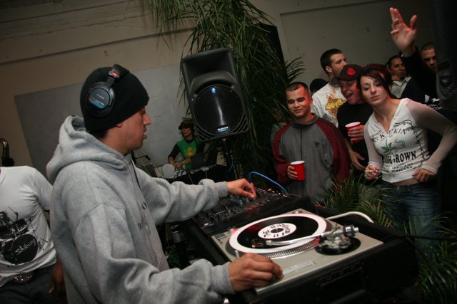 DJ Raul R Entertaining the Crowd in his Grey Hoodie
