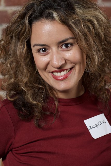 Curly-haired Woman with Captivating Smile
