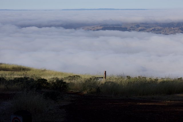 Sea of Clouds Swallowing the Valley Below
