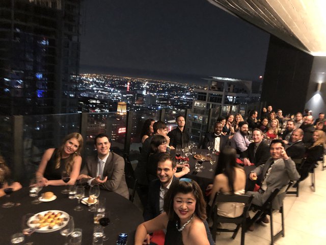 Elegant Evening Party with City Skyline Views
